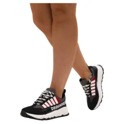 Zwarte leren kindersneakers met witte strepen